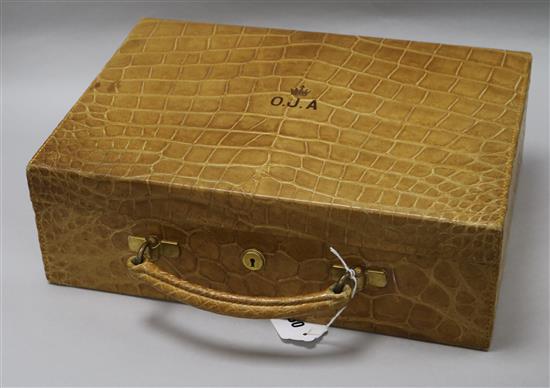 A Goldsmiths & Silversmiths Co. Ltd crocodile skin jewellery case, 36 x 26 x 12cm